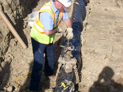 Lincoln Water System employee connecting water service to a new home