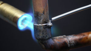 Photo of copper pipe with lead solder