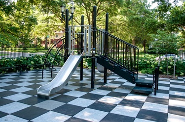 Playground structure with slide