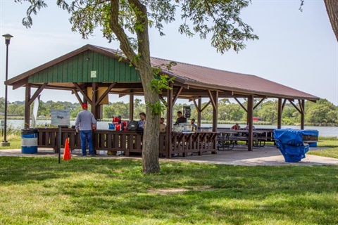 Oak Lake Park has an open shelter with picnic tables near the playground.