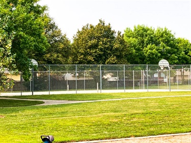 Filbert's two half court basketball courts are enclosed with a chain link fence and is located near the playground.