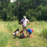 Nature Center campers explore the ecosystem they walk on.