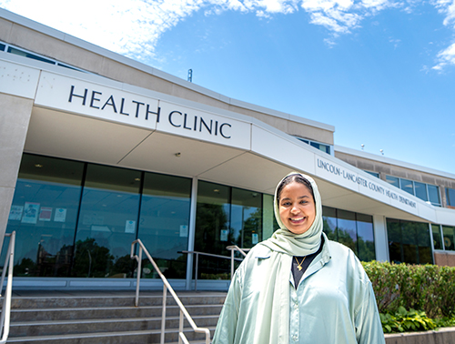 Reem, a participant in the Mayor's Youth Employment Program, poses for a photograph.