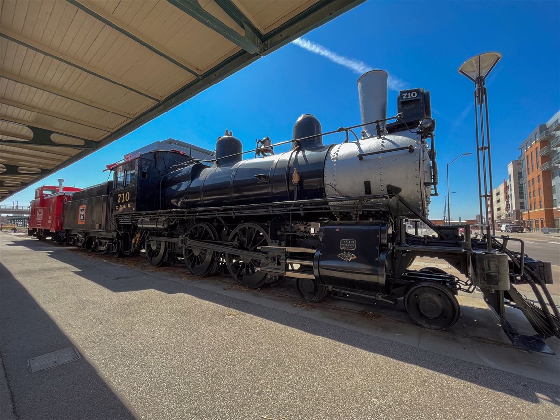 A black and silver steam engine train. 