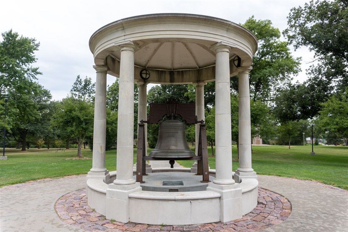 The front of the replica Liberty Bell with Antelope park in the background