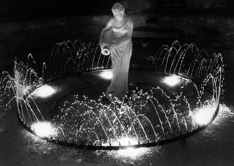 black and white image of Rebekah at the Well in her fountain