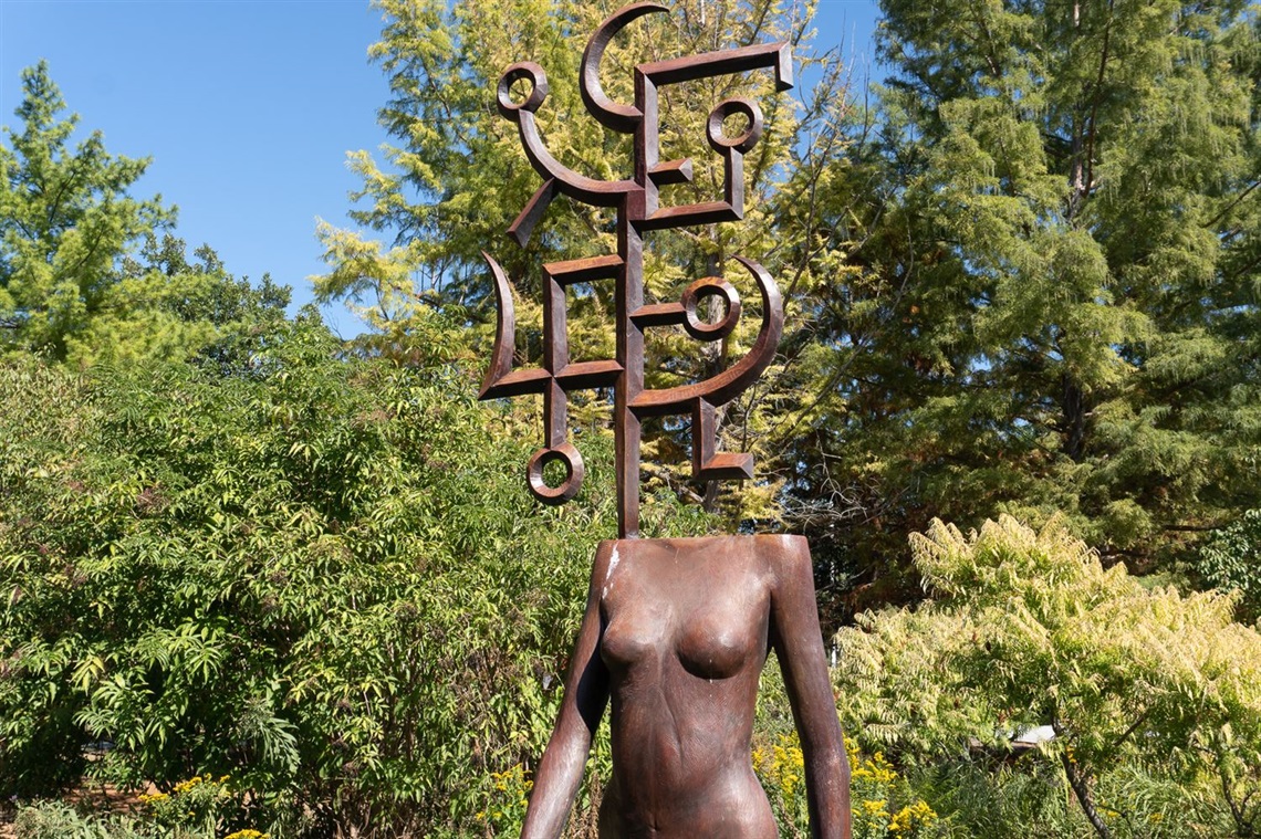 The top half of the Palo Alto sculpture, a woman's body with the head replaced by an abstract figure