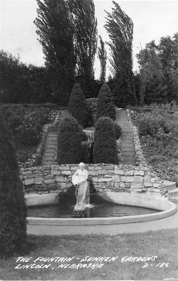 black and white image of the sculpture, Rebecca at the well at the bottom of the stairs in Sunken Gardens with the text 