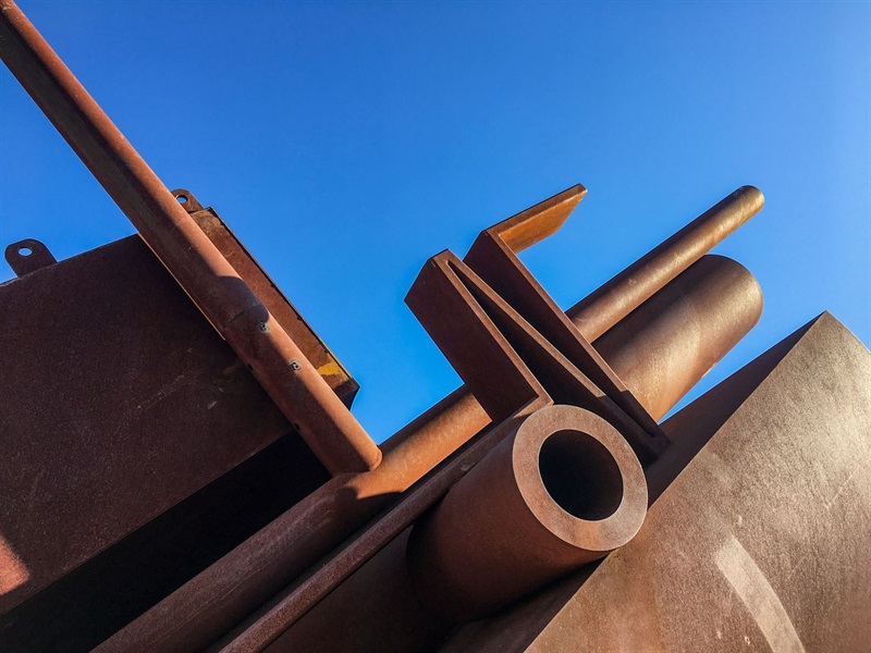 a close up view of Tilted Donut no. 7 looking up at the rods and tubes