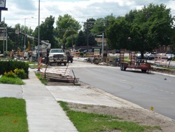 Road under construction with a truck and other equipment