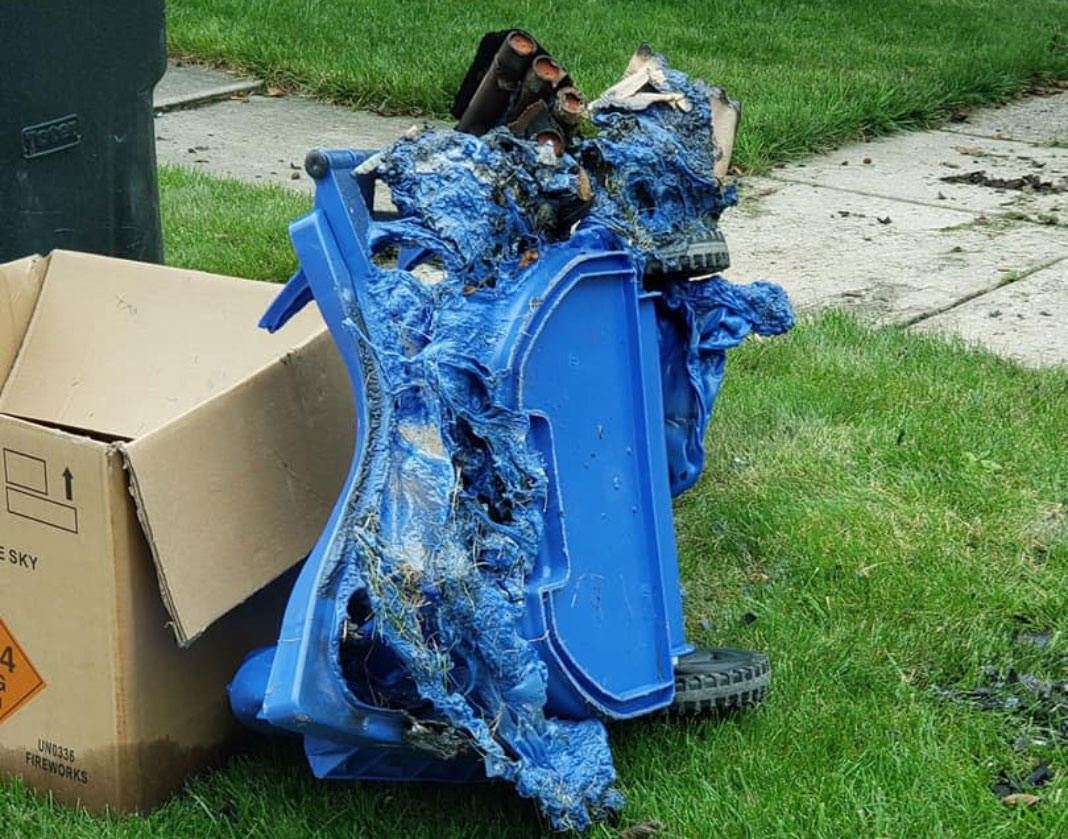 Melted trash can from an inappropriately disposed firework