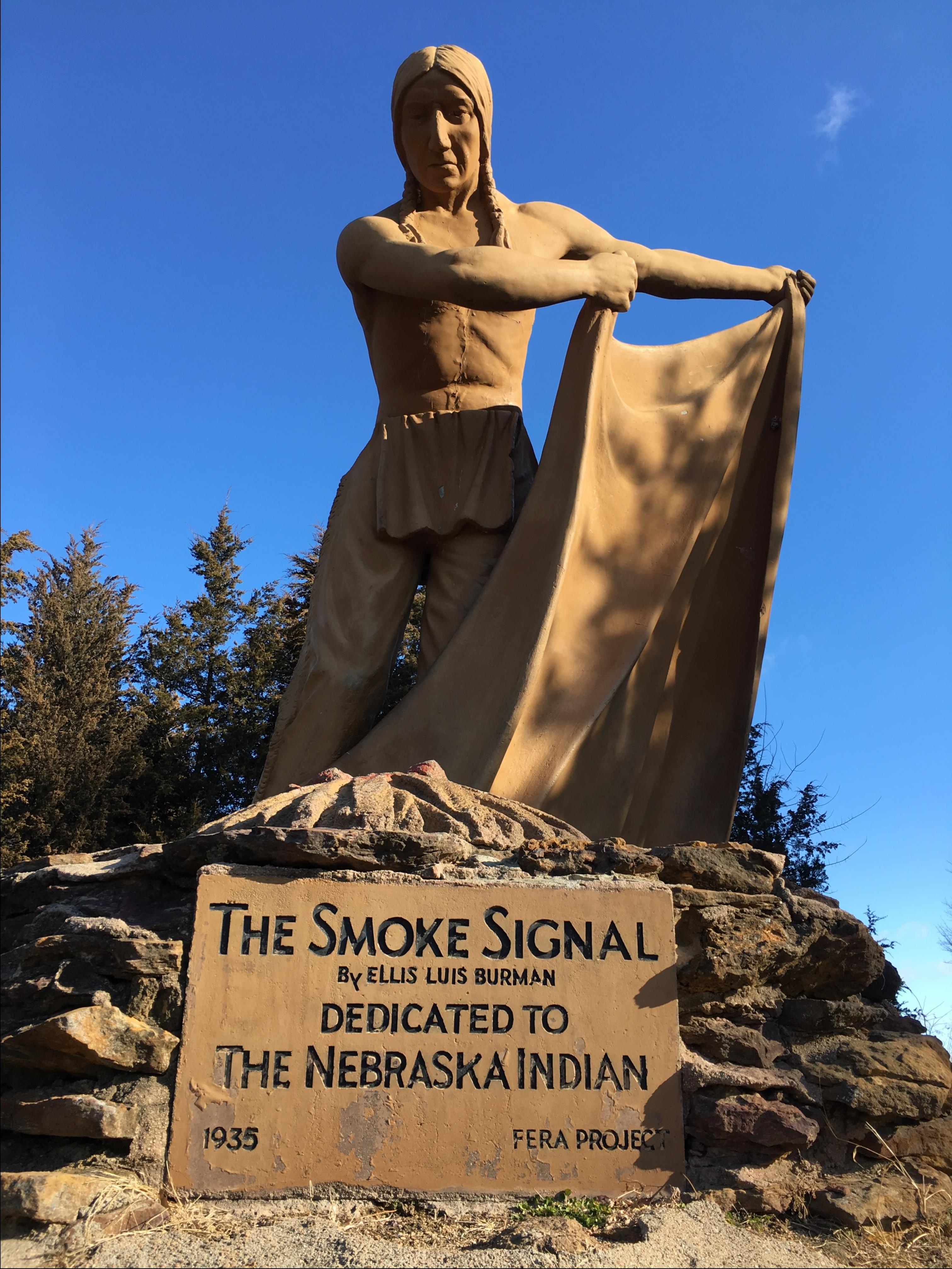 A full body image of Smoke Signal with the dedication plaque 
