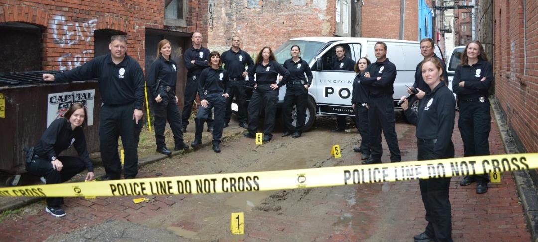 Photograph of a group of crime scene technicians